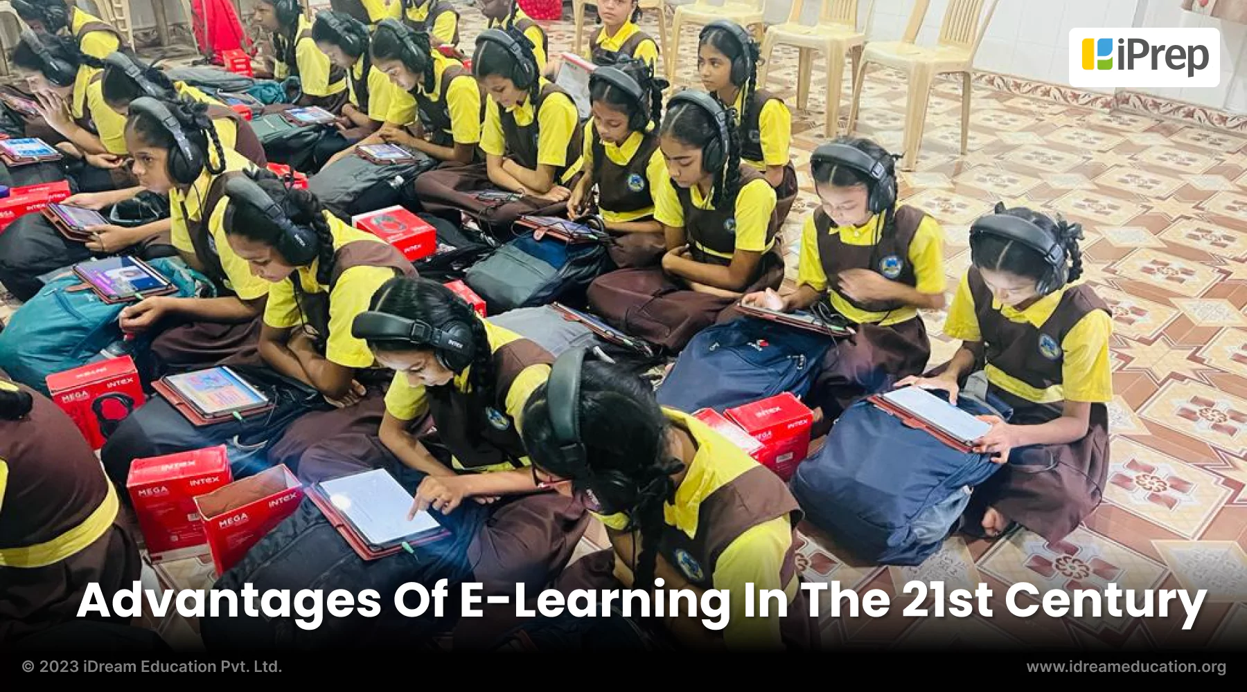 an image of school students getting their hands on the advantages of e-learning with iPrep Learning tablets